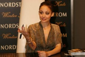 Nicole Richie, brown gold and black sheer blouse, gold bracelets